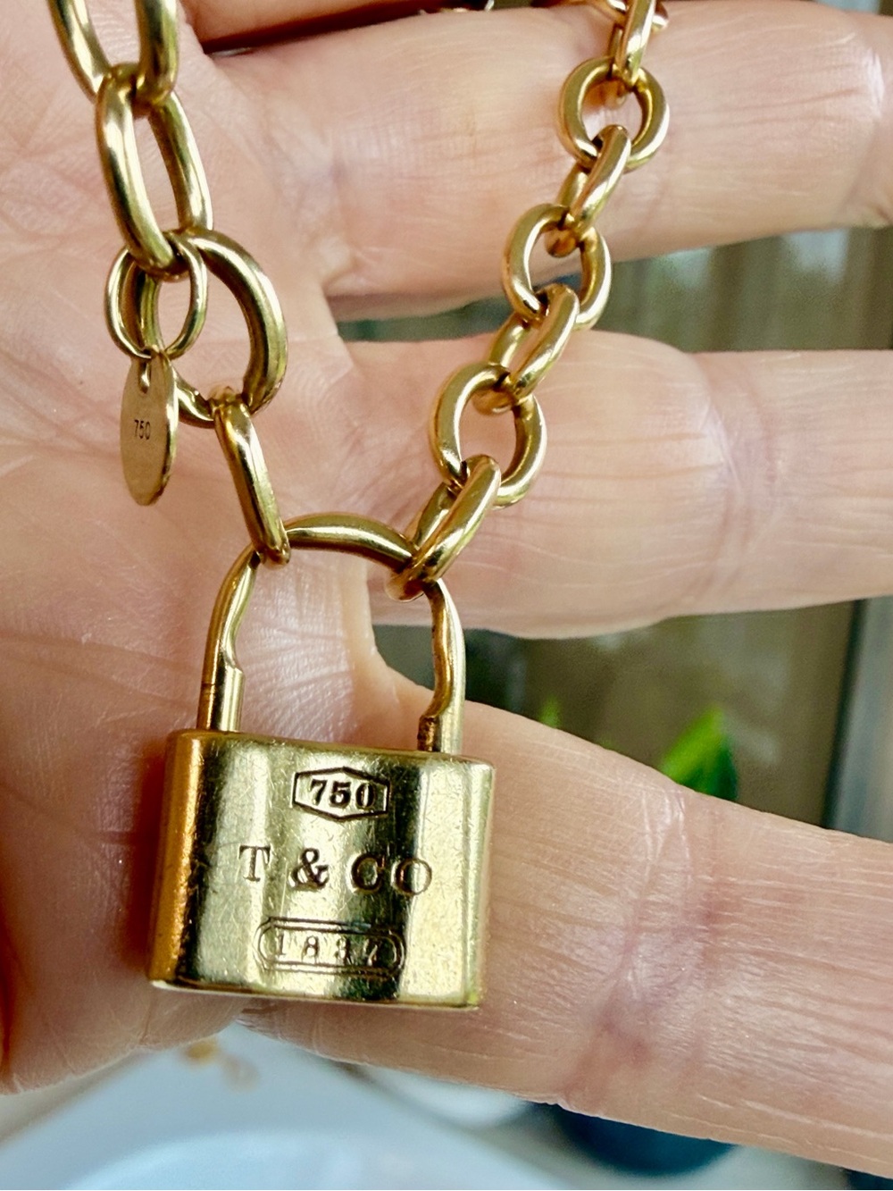 Tiffany and Co. 18 karat gold lock bracelet